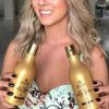 Shampoo de Hidratação Ouro Dyusar Cosméticos 1L mostrando lindos cabelos