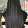 Liso com pontas perfeitas, usando o Óleo Reparador de Pontas Line Golden Dyusar